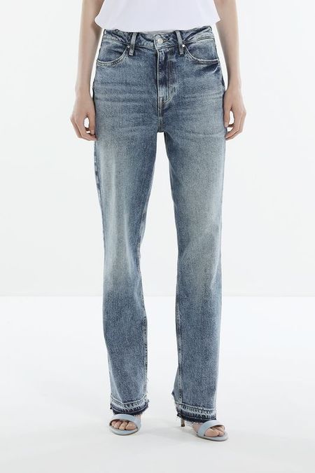 Джинсы с эффектом потертости Guess